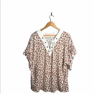 Blue Buttercup | White & Cream animal print Lace Up Ruffle Sleeve Blouse